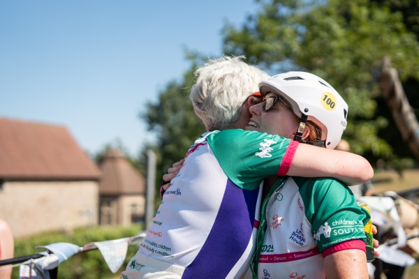 Riders celebrating at the finish